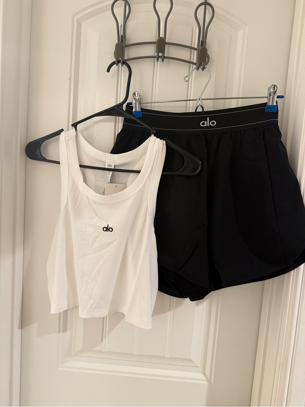 White Tank Top and Black Athletic Shorts